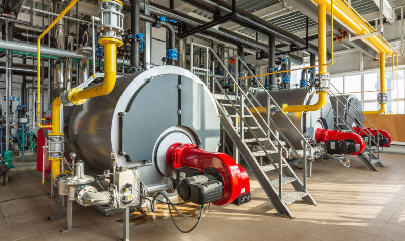 The,Interior,Of,An,Industrial,Boiler,Room,With,Three,Large